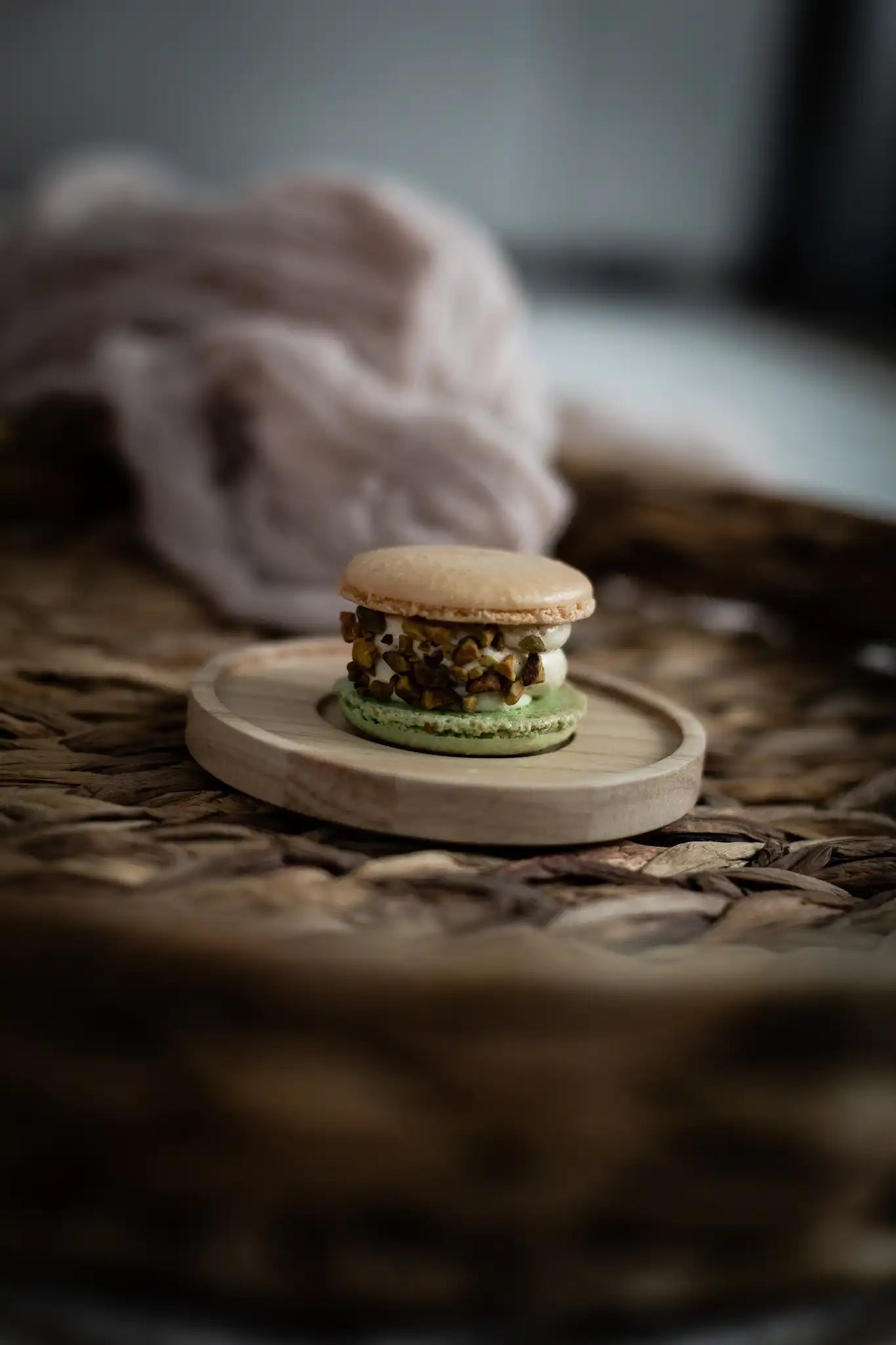 ONECOLOURS-COOKIE-POLICY-PISTACHIO-MACARON-ON-WICKER-TRAY